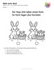 Ausmalbild Hase neben Korb mit drei Karotten