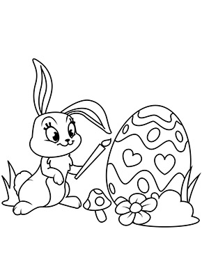 Hase bemalt ein Ei